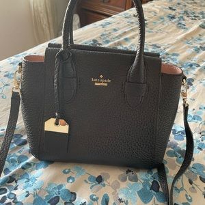 Kate spade crossbody bag with handle.